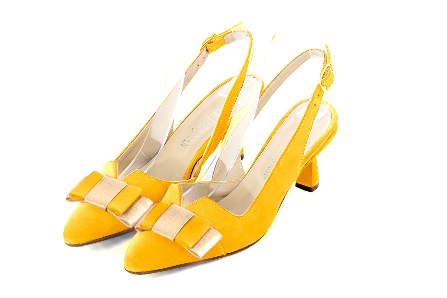 Yellow and gold matching shoes and clutch. View of shoes - Florence KOOIJMAN